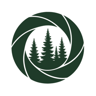 Evergreen PhotoWorks Evergreen PhotoWorks logo — evergreen trees with a camera aperture